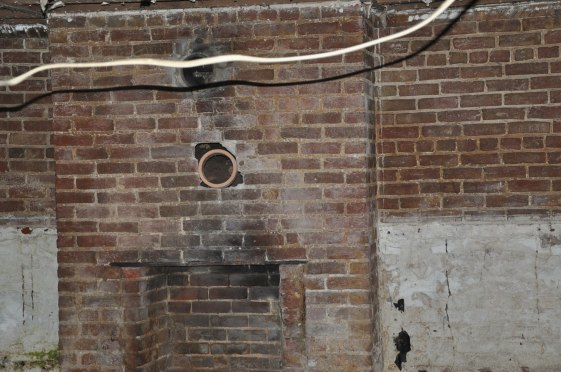 1st room from the basement stairs.